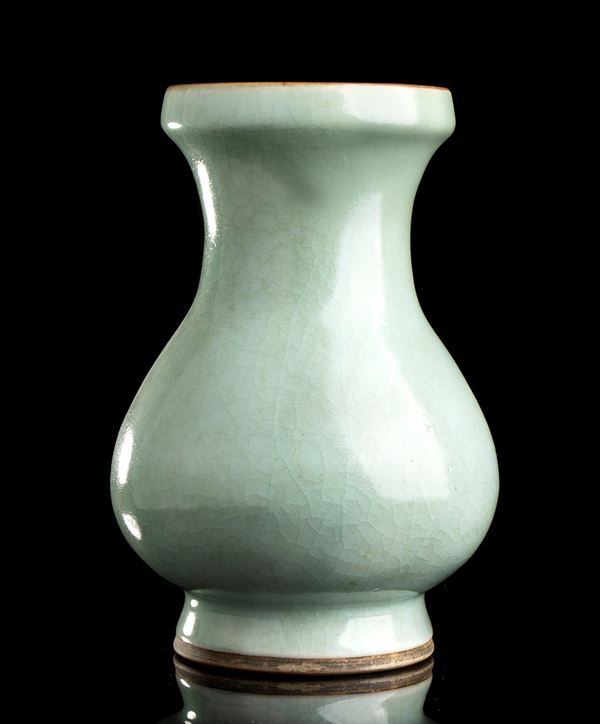 A CÉLADON GLAZED CERAMIC VASE