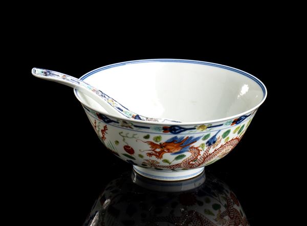 A POLYCHROME ENAMELLED PORCELAIN BOWL AND SPOON