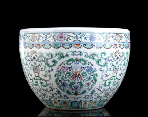 A LARGE POLYCHROME ENAMELLED PORCELAIN CACHEPOT