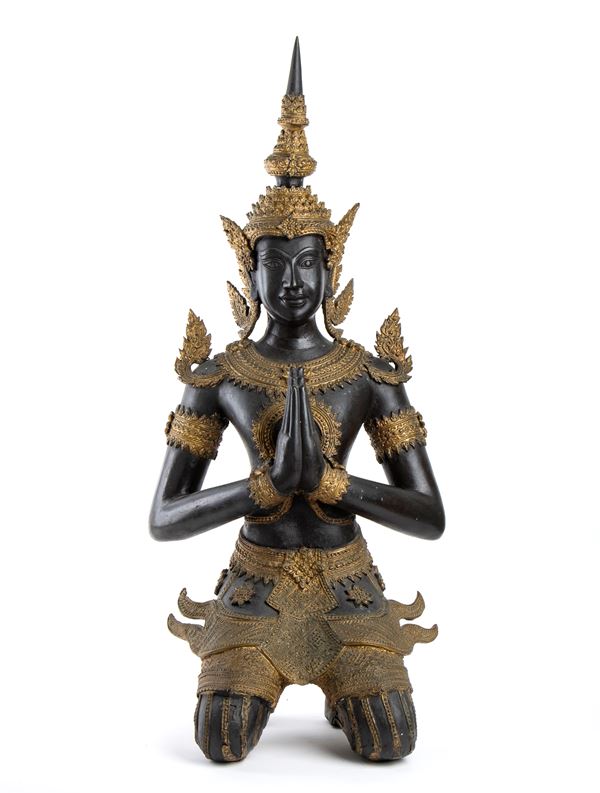 A LARGE PARTIALLY GILT BRONZE SCULPTURE OF A THEPANOM GUARDIAN