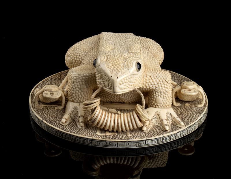 COMPOSIZIONE CON ROSPI E MONETE IN OSSO