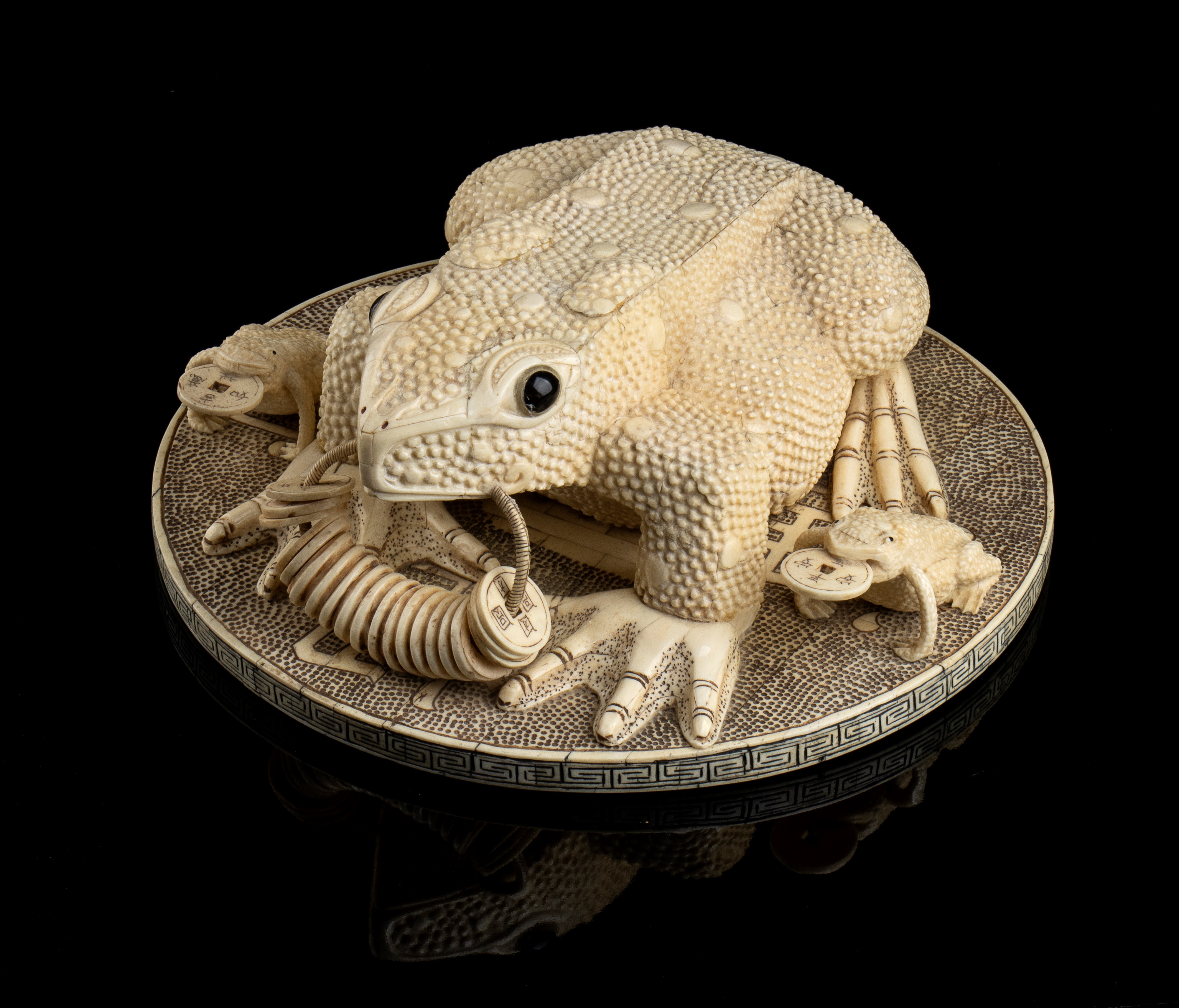 COMPOSIZIONE CON ROSPI E MONETE IN OSSO