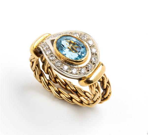 Gold aquamarine and diamonds ring