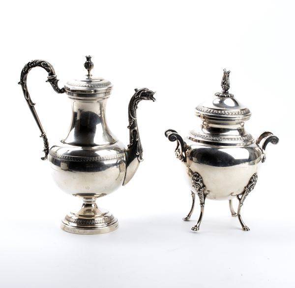 Silver teapot and sugar bowl