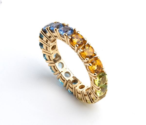 Anello Eternity in oro con zaffiri multicolore   