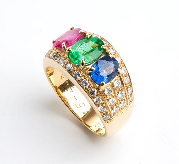 Emerald, composite ruby, sapphire gold band ring 