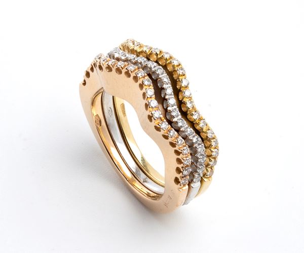 Three gold and diamond modular rings 