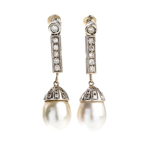 Pair of gold earrings with Australian pearls and diamonds.   