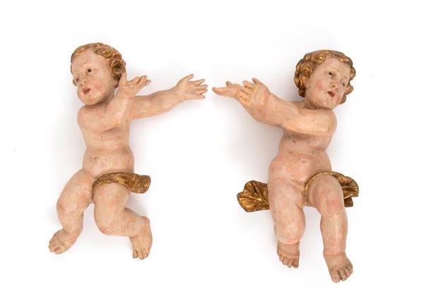 A pair of Italian putti