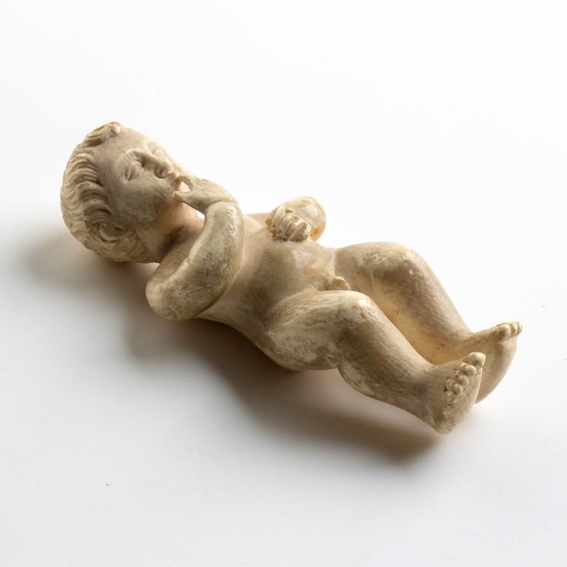 Scultura in avorio di elefante scolpito a tutto tondo raffigurante il Bambino Gesù (Francia, XIX ...