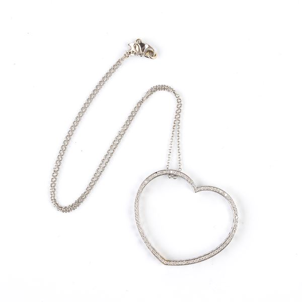 Necklace with gold and diamond heart pendant