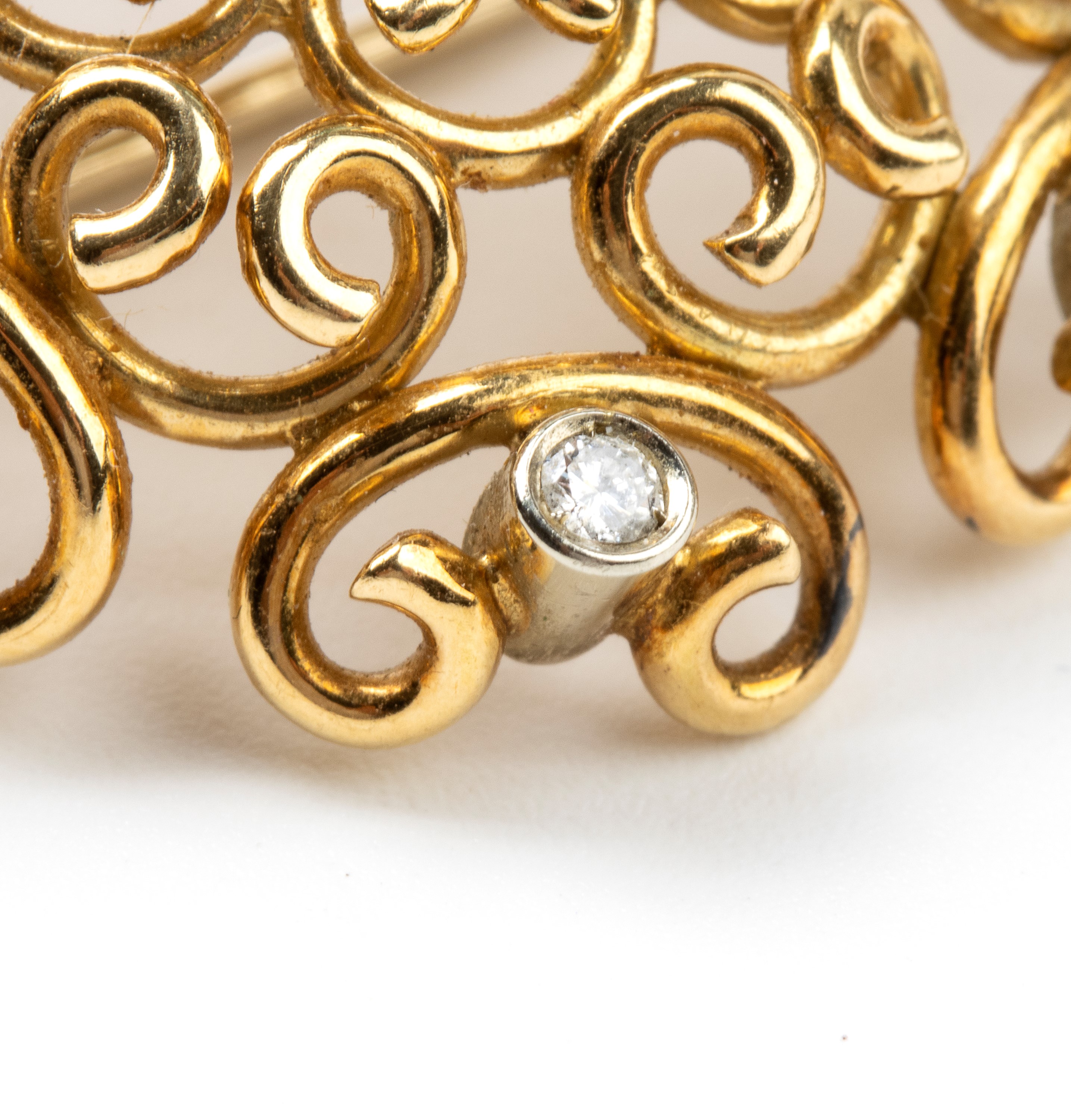 Spilla in oro, diamanti e turchese