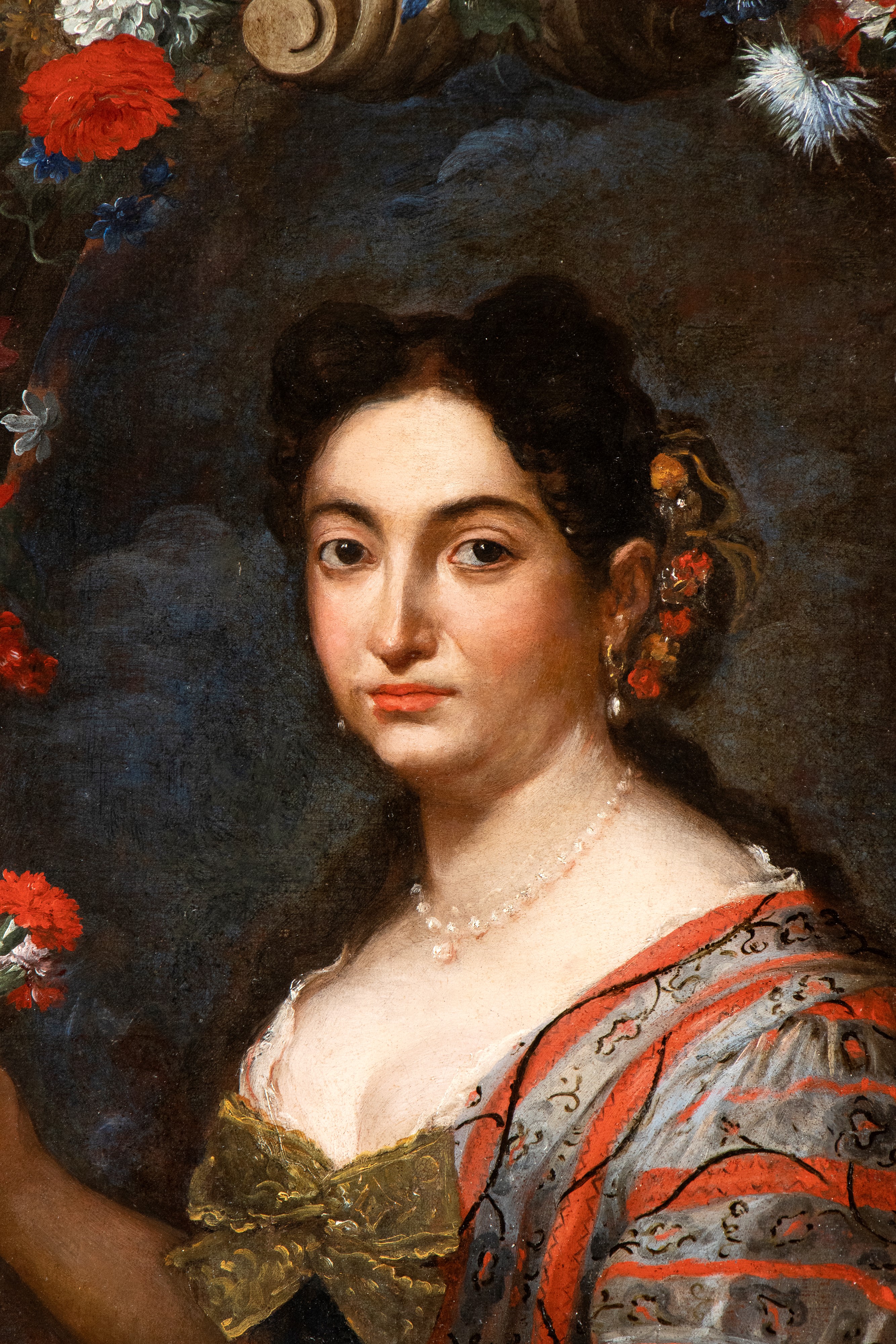 Ritratto di dama con garofano entro ghirlanda di fiori