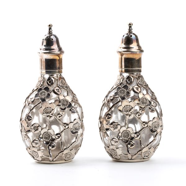 Pair of sterling silver and glass salt shakers