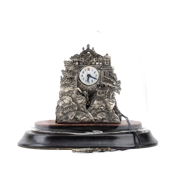 Silver table clock with glass dome