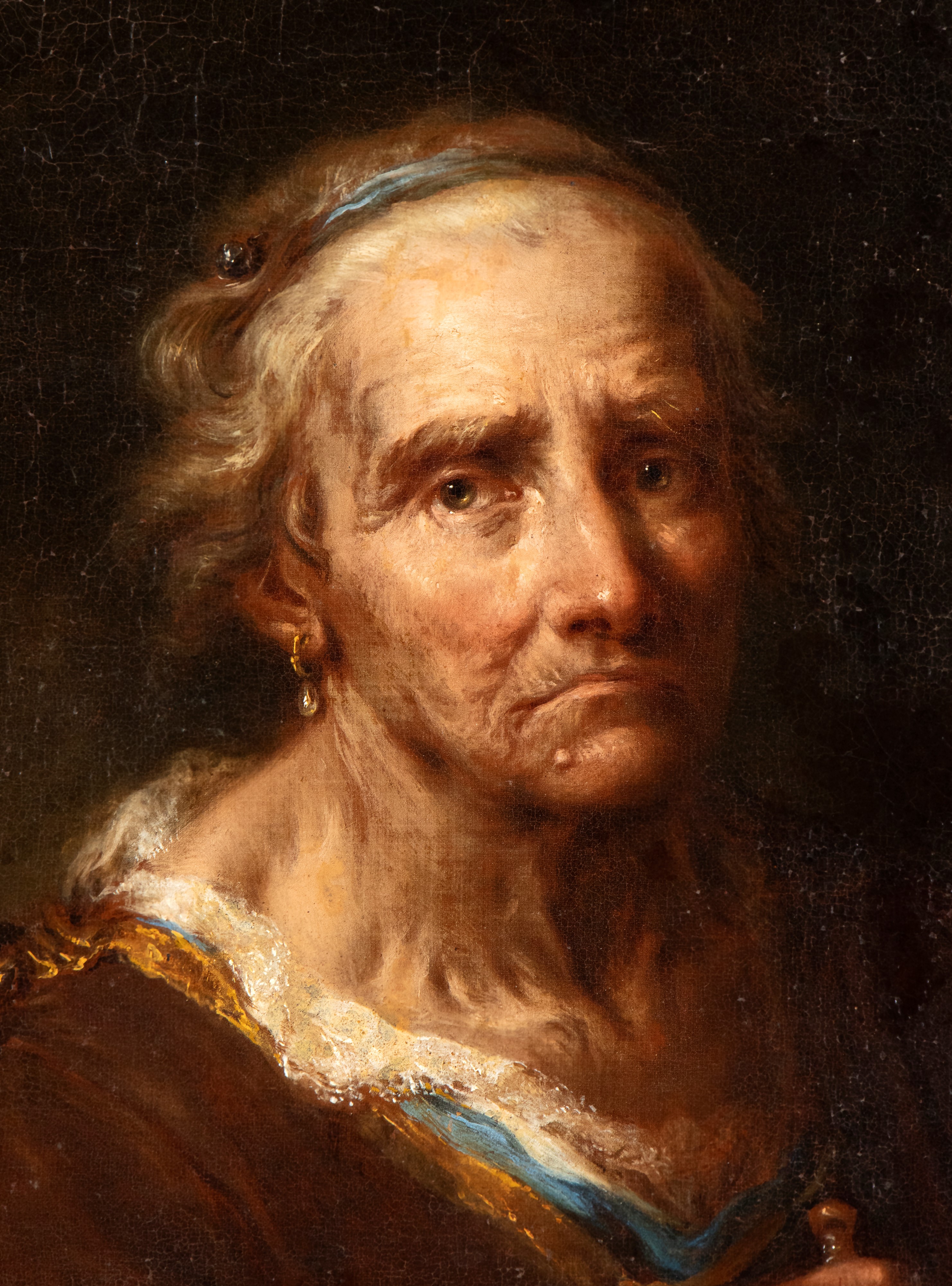 Ritratto di anziana che cuce