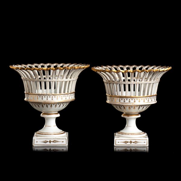 A pair of French reticulated porcelain basket