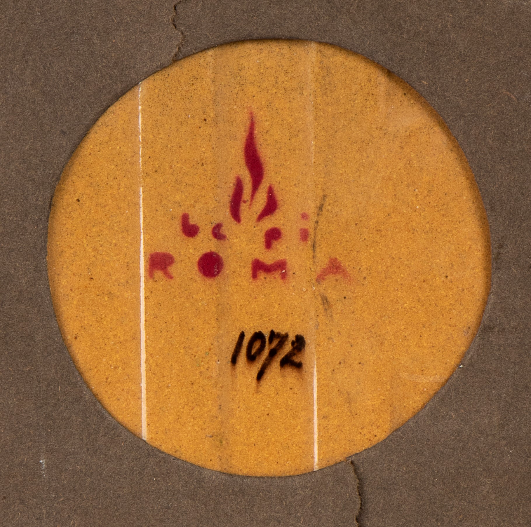 Mattonella con decorazione di ritratto femminile