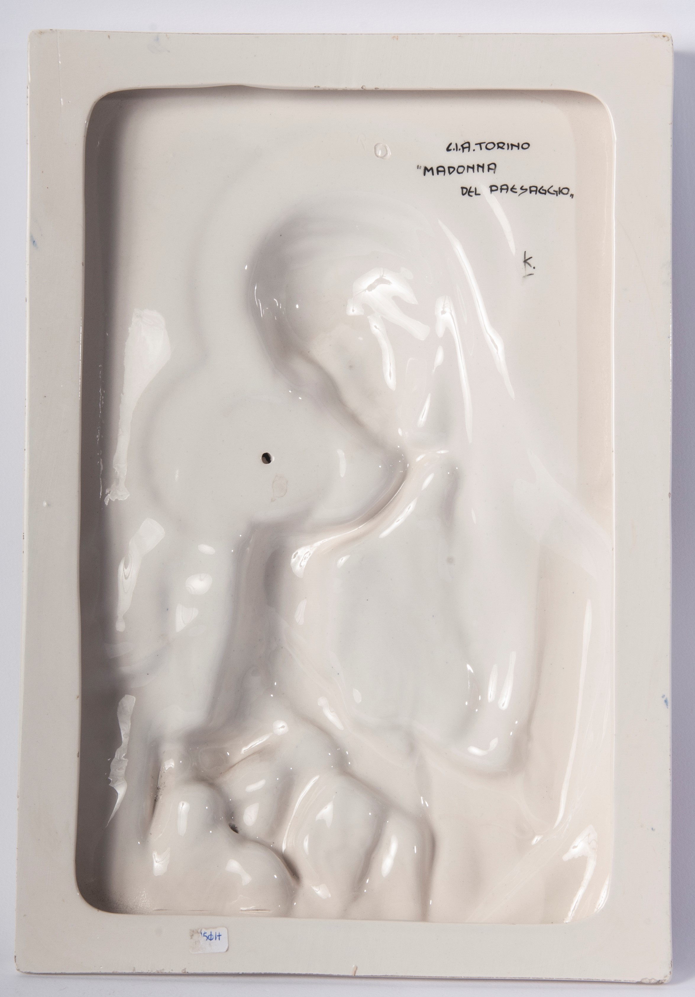 Madonna col Bambino, piastra a rilievo