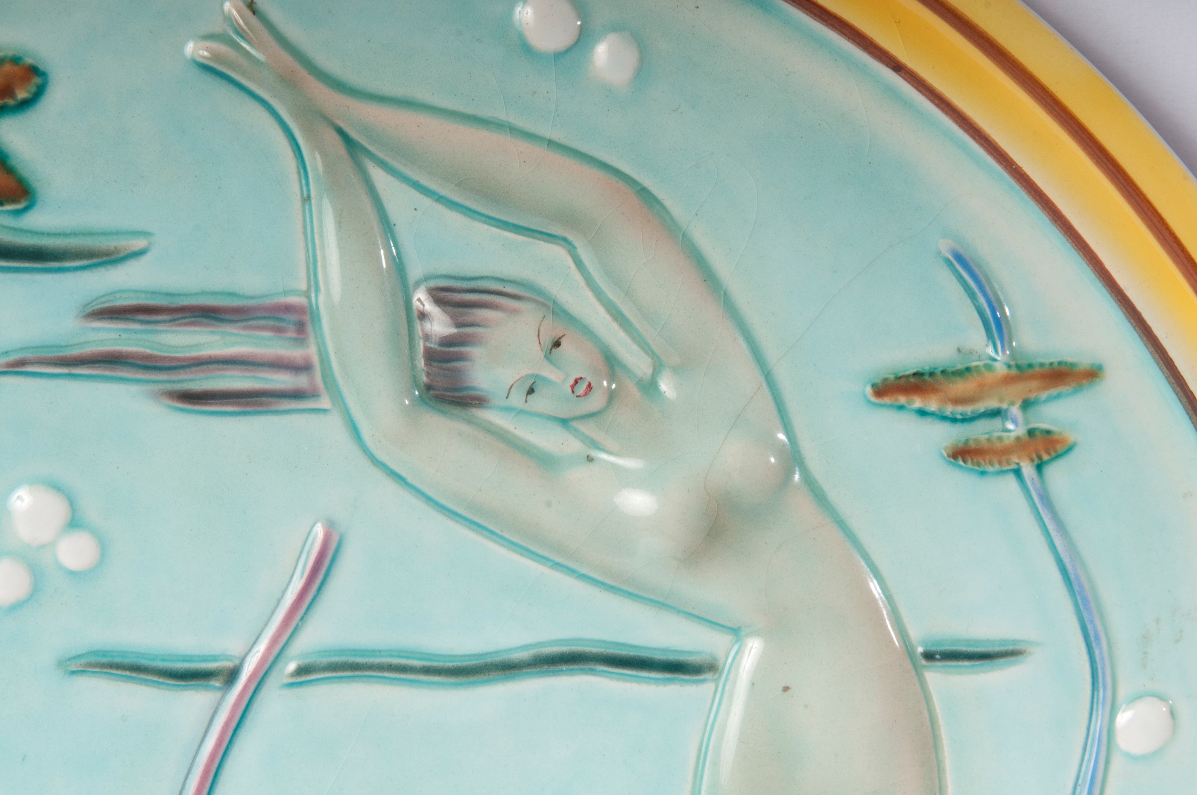 Piatto da muro con pesci e nuotatrice