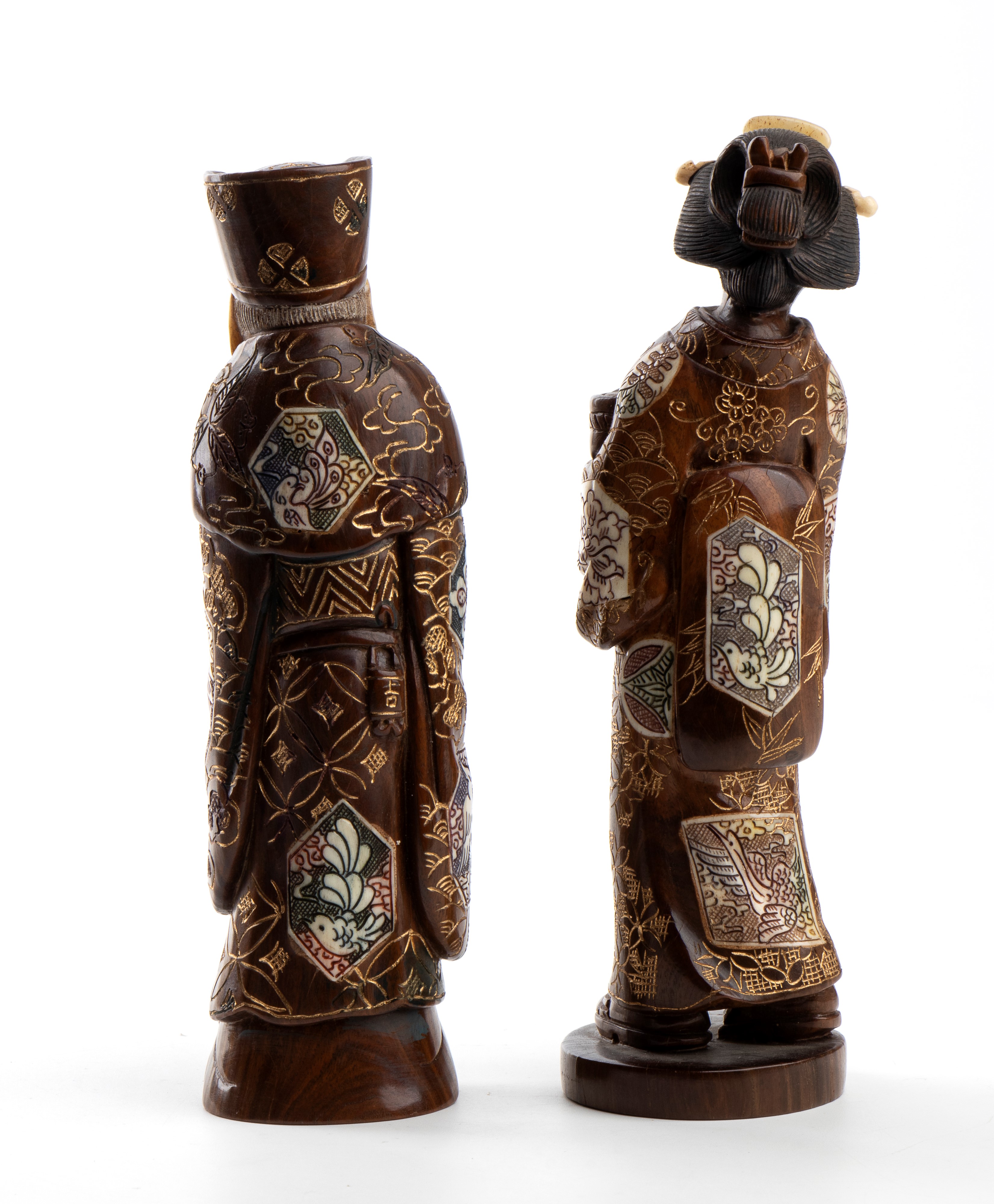 Okimono giapponesi in osso, Coppia di figure di anziano e donna, periodo Meiji