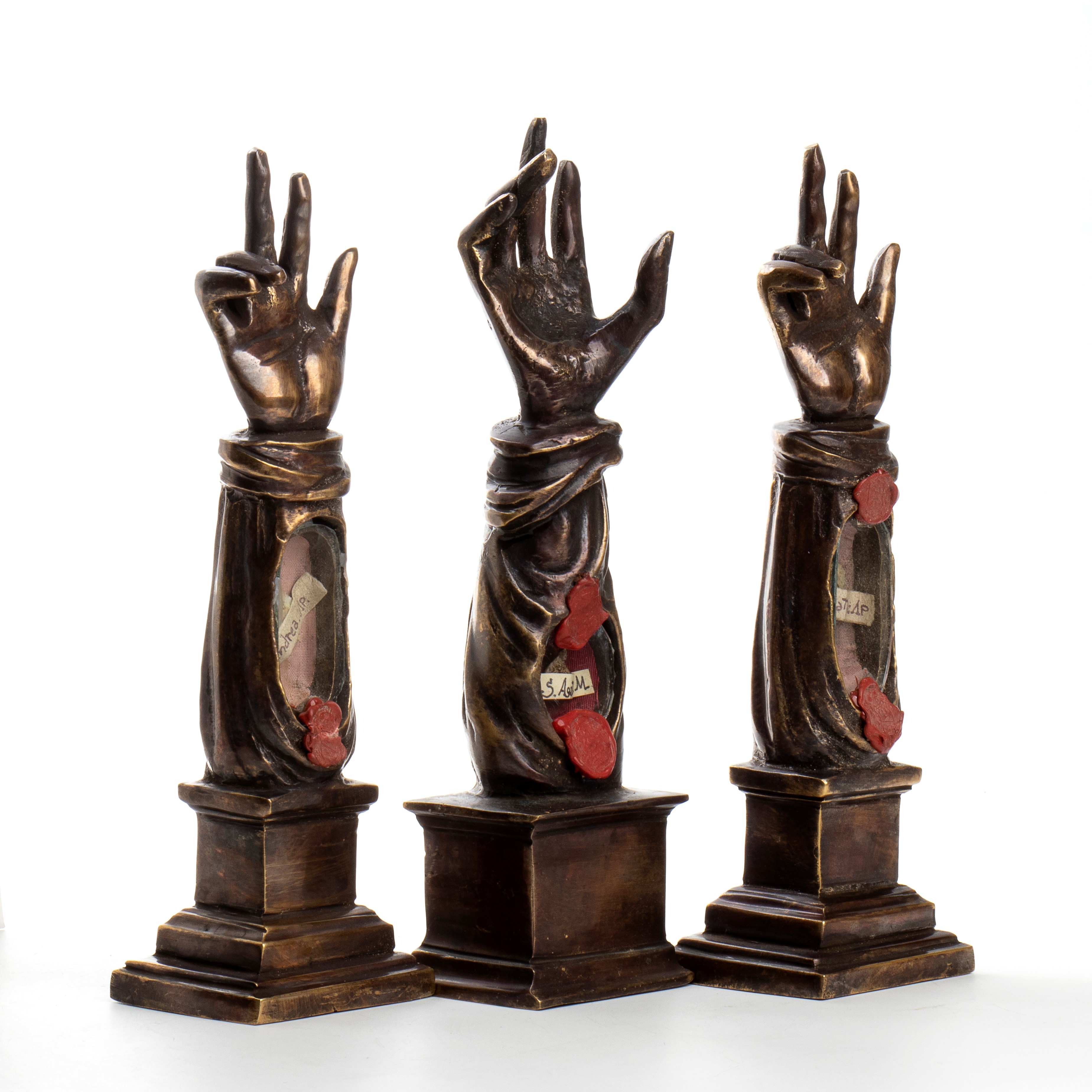 Gruppo di tre reliquiari antropomorfi, reliquiari parlanti, argento e cristallo di rocca, XIX sec...