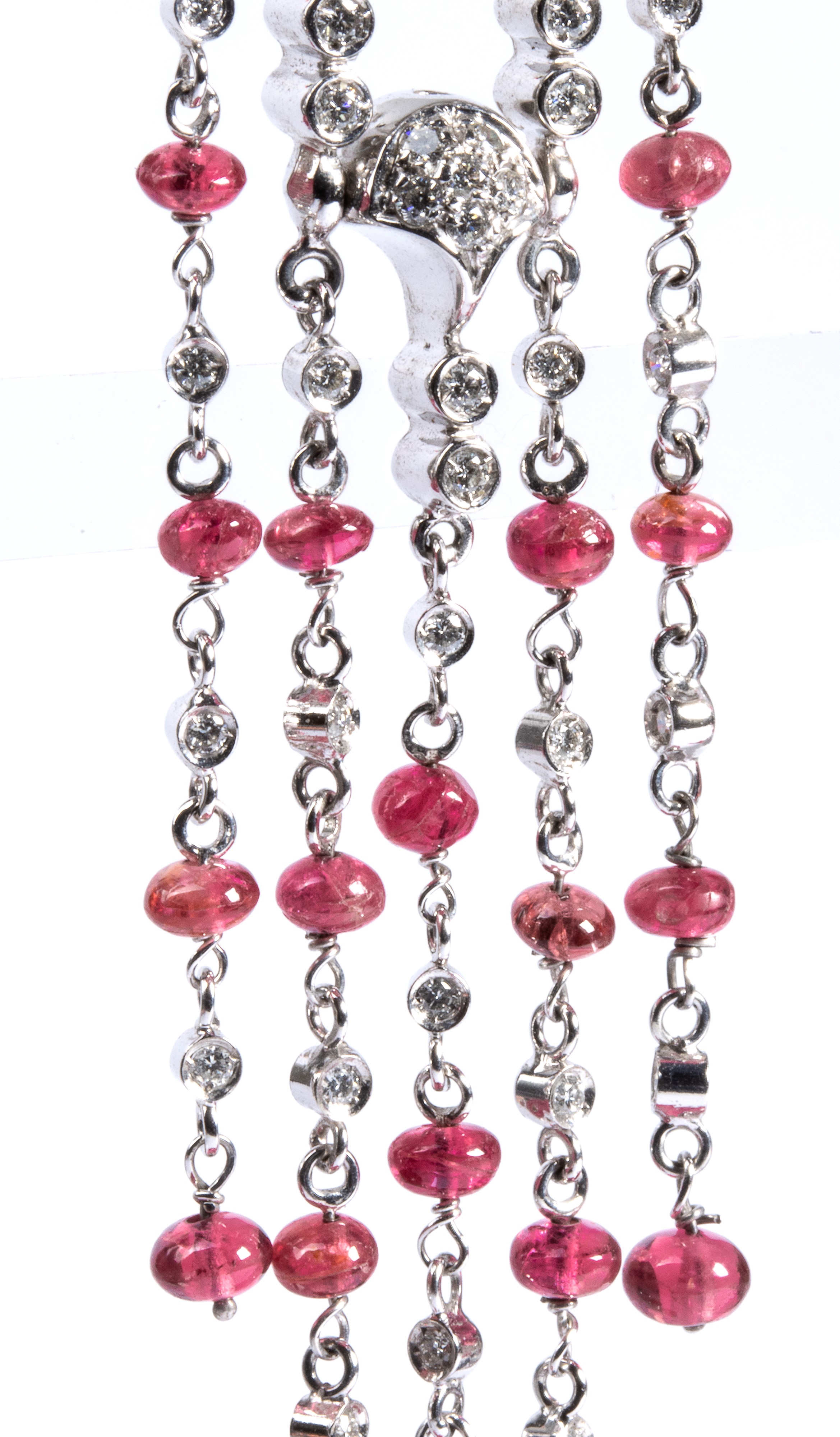 Paio di orecchini in oro con diamanti e spinelli