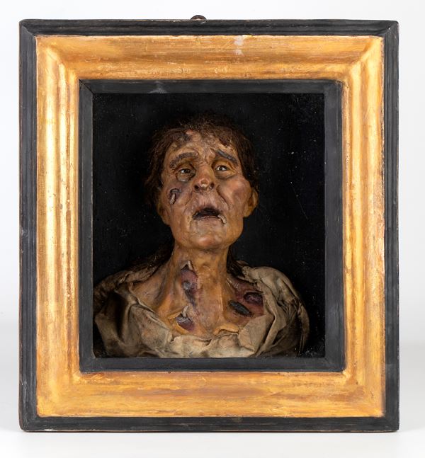 Ceroplastic depicting a plague figure