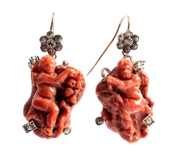 Putto's coral earrings