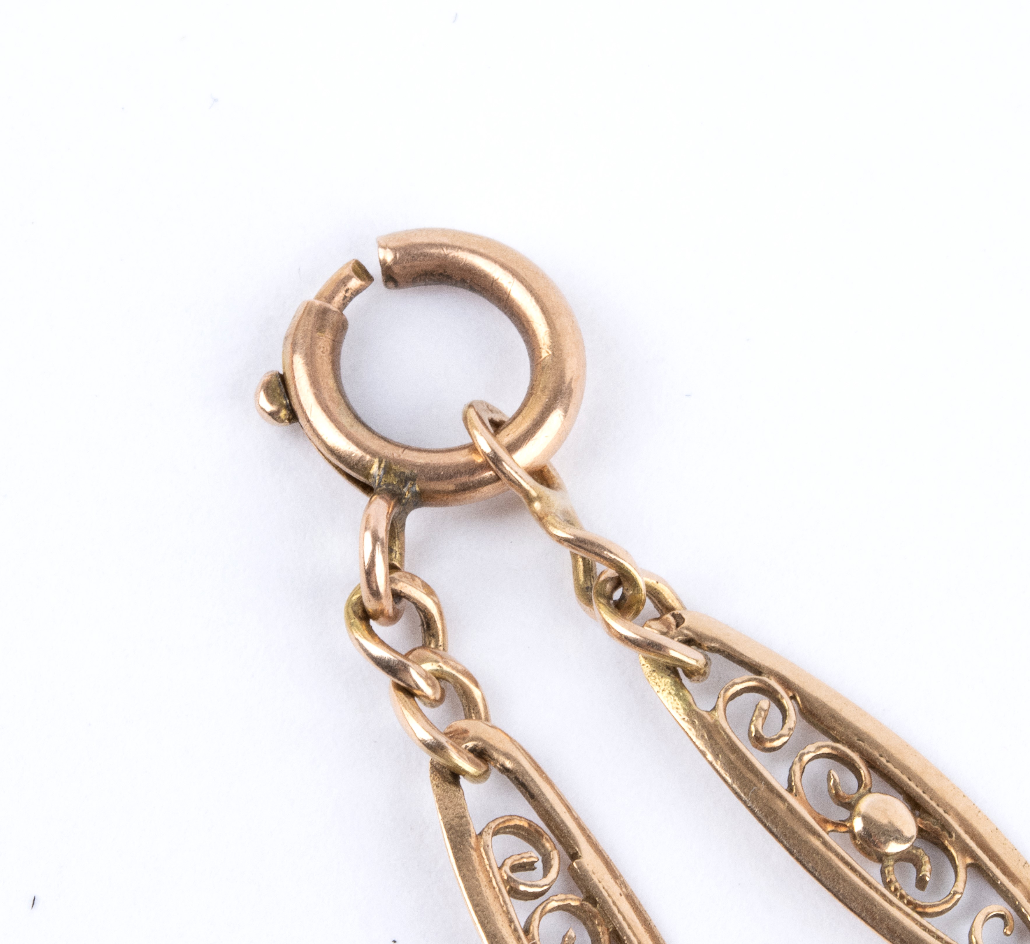 Catena per orologio in oro a rombi traforati con chiusura a moschettone