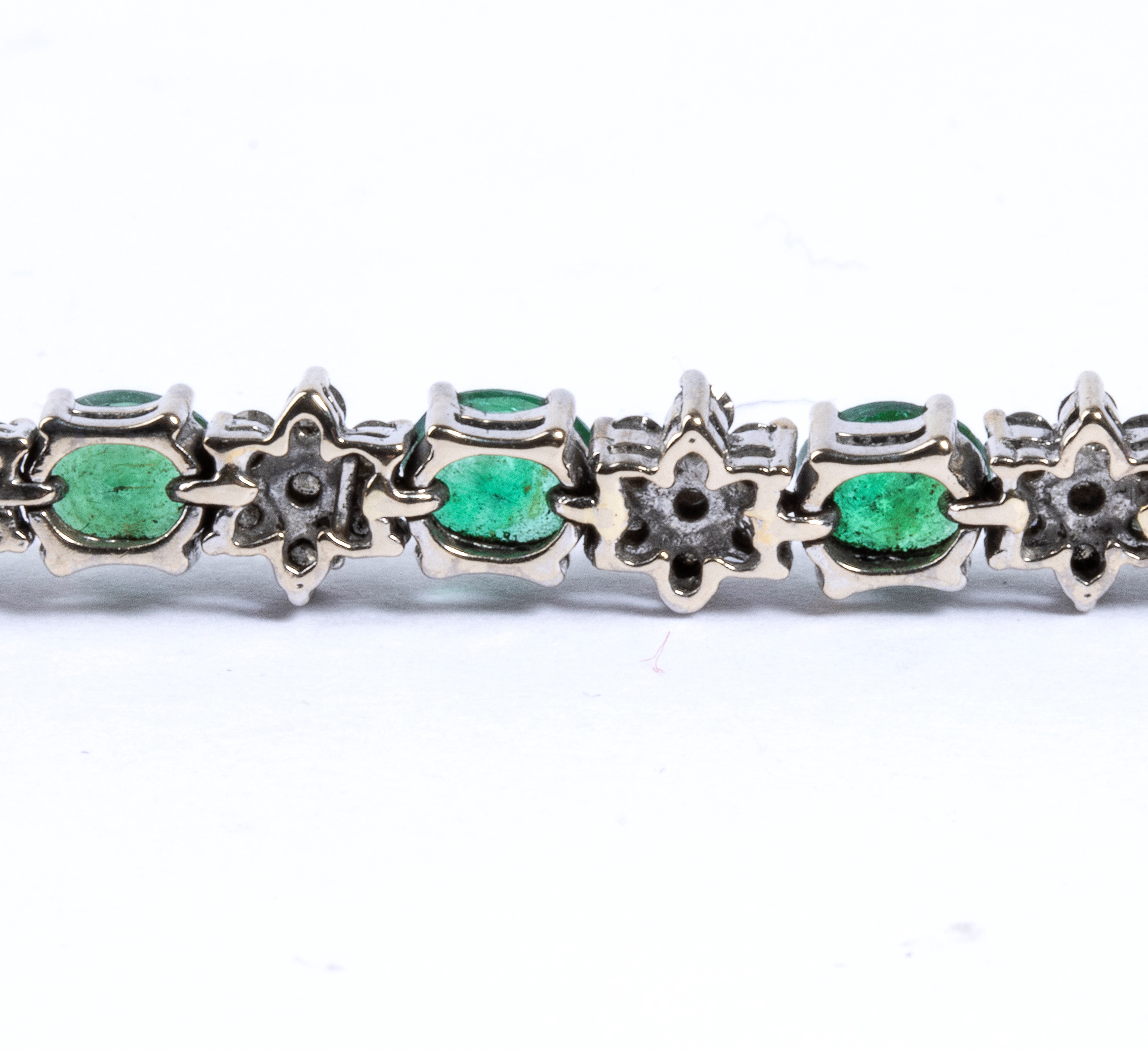 Bracciale in oro con smeraldi e diamanti