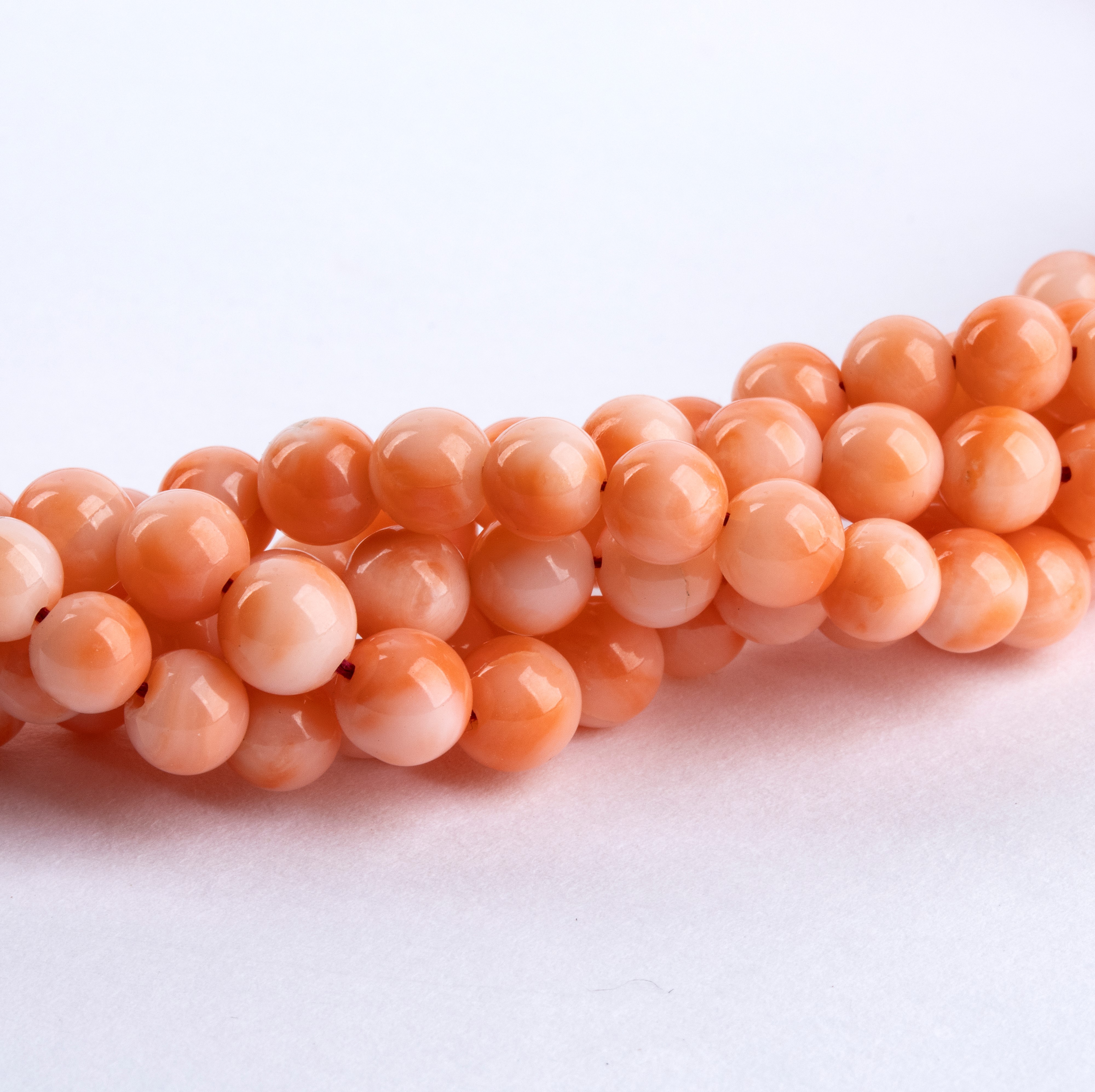 Girocollo a torsade in corallo rosa