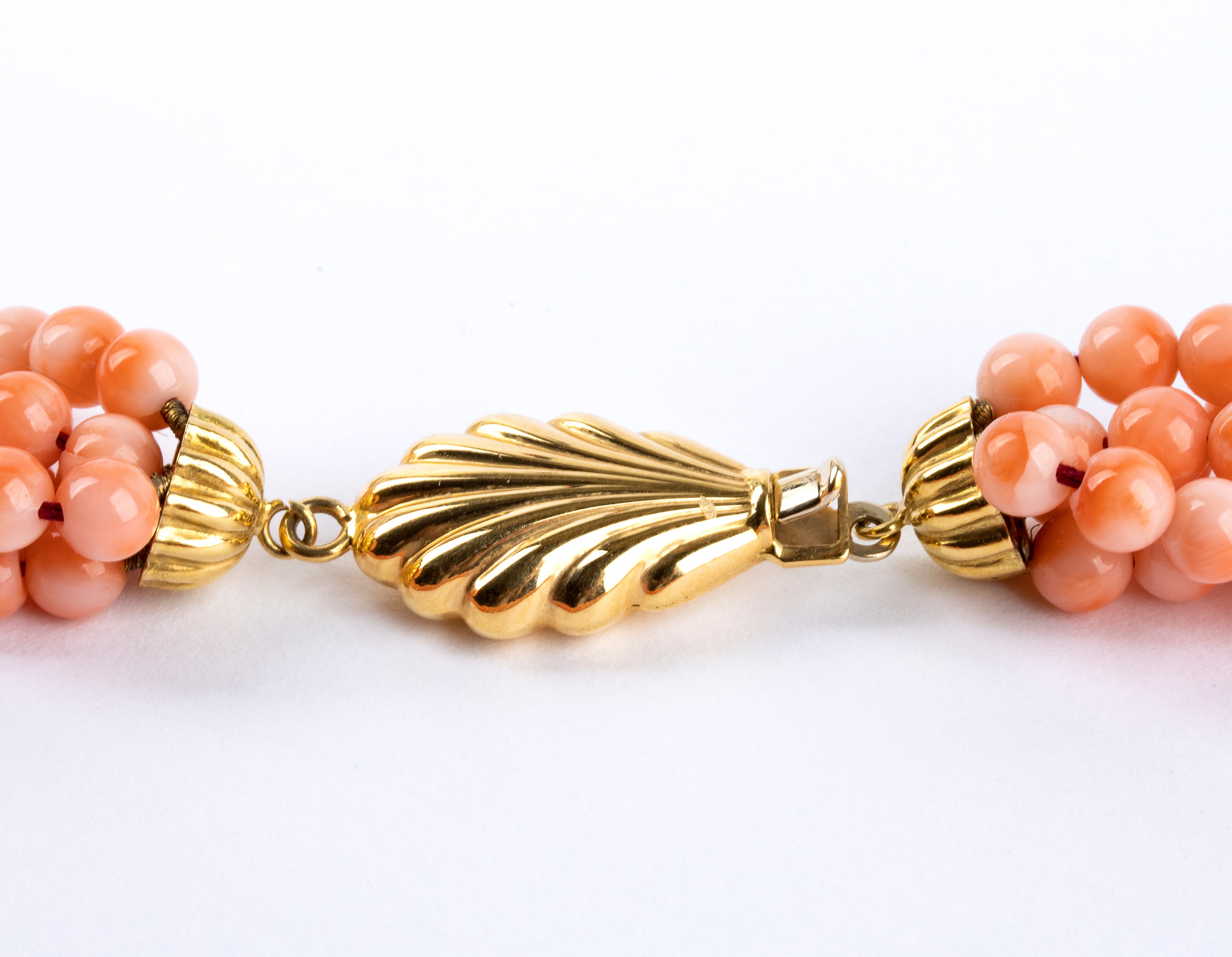 Girocollo a torsade in corallo rosa