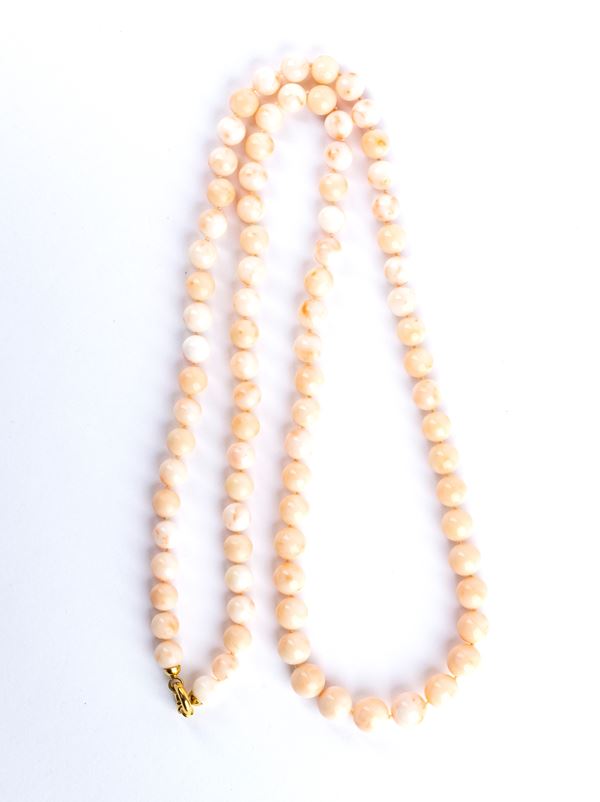 Long pink coral necklace