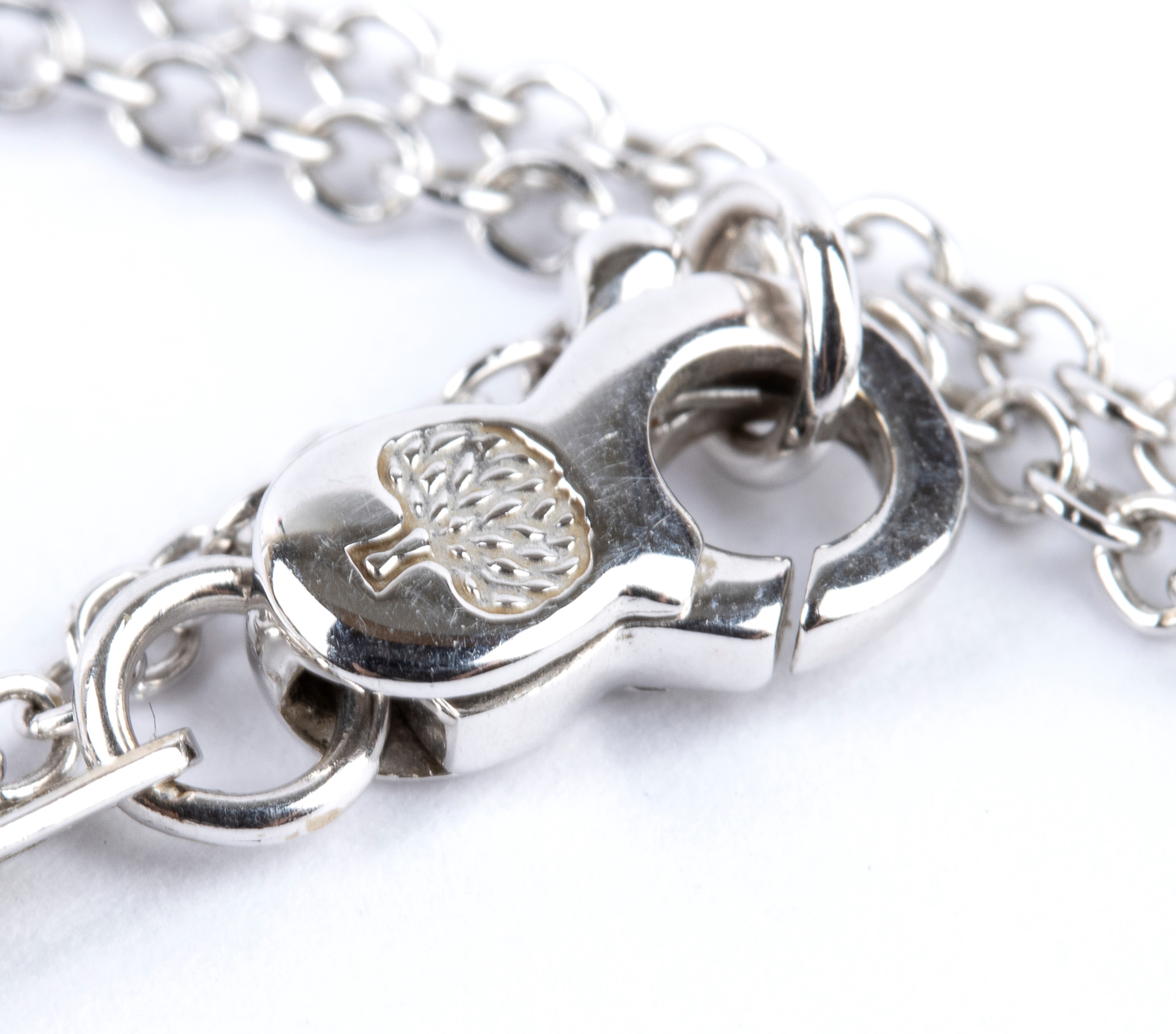 Girocollo in oro con barretta in diamanti, frangia in onice e perle di fiume.