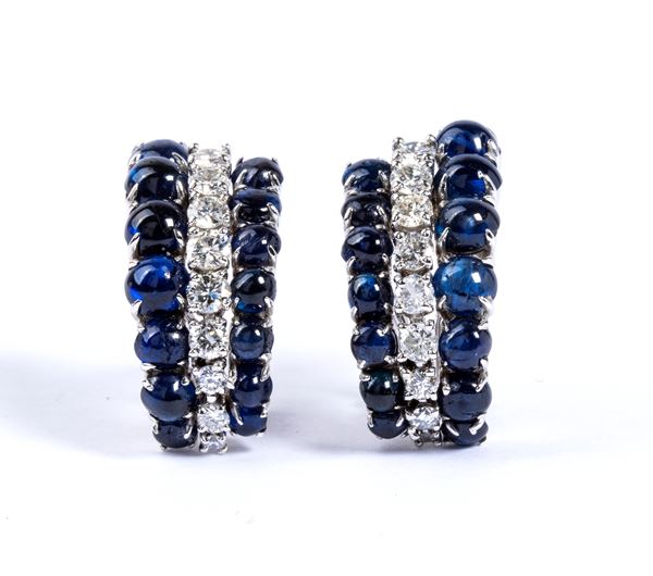 Gold diamond blue sapphire pair of earrings