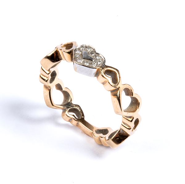 Gold diamond heart motif ring