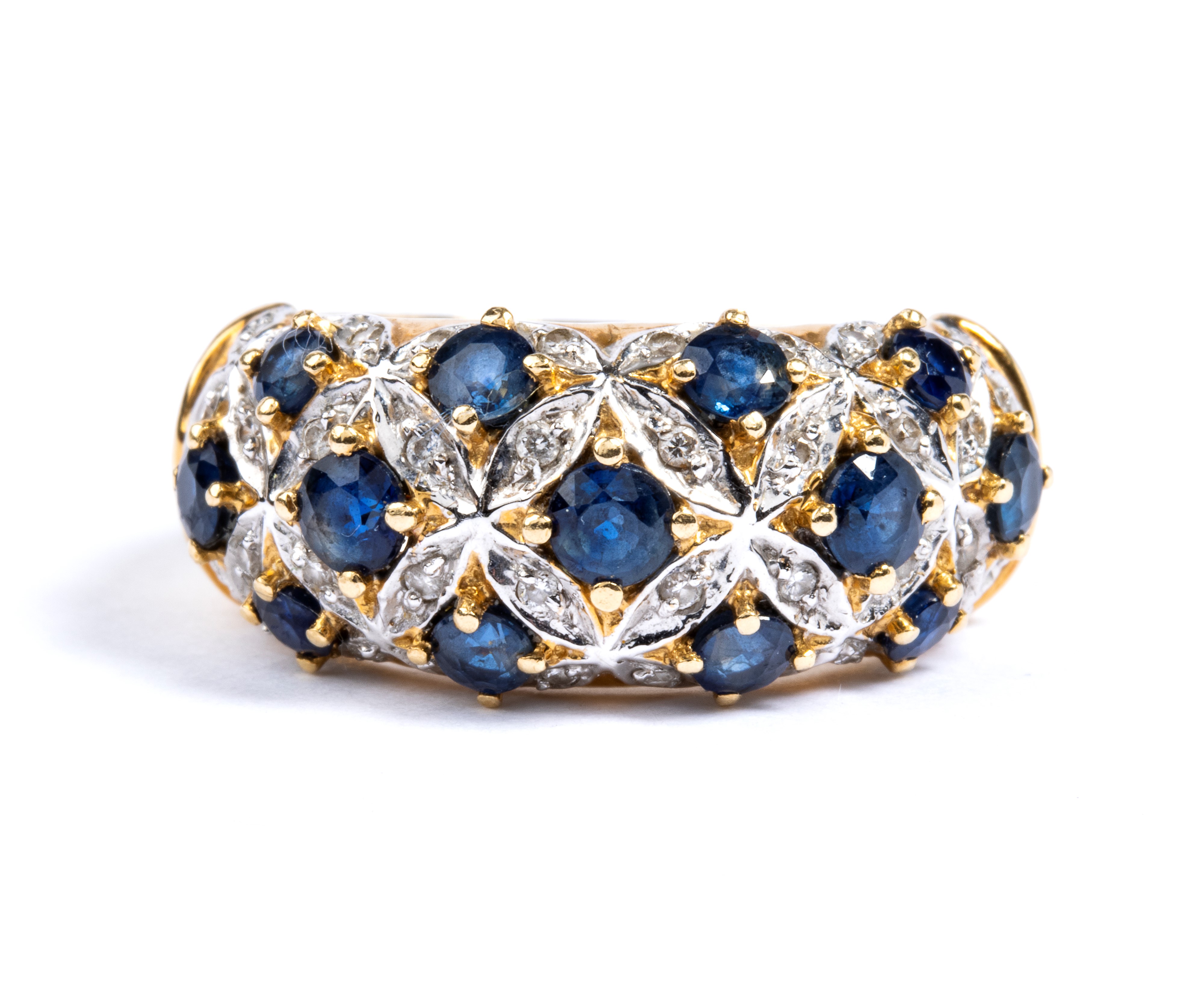 Anello a fascia in oro con zaffiri e diamanti