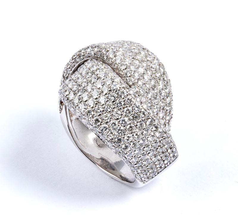 Anello a fascia incrociata in oro e pavé di diamanti