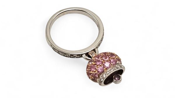 Ring with bell pendant in gold pink corundum and diamonds.