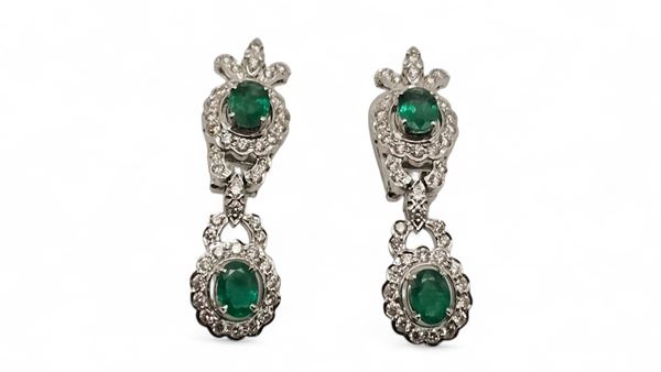 Pair of gold diamond emerald drop earrings 