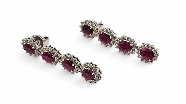 Pair of gold diamond ruby drop earrings