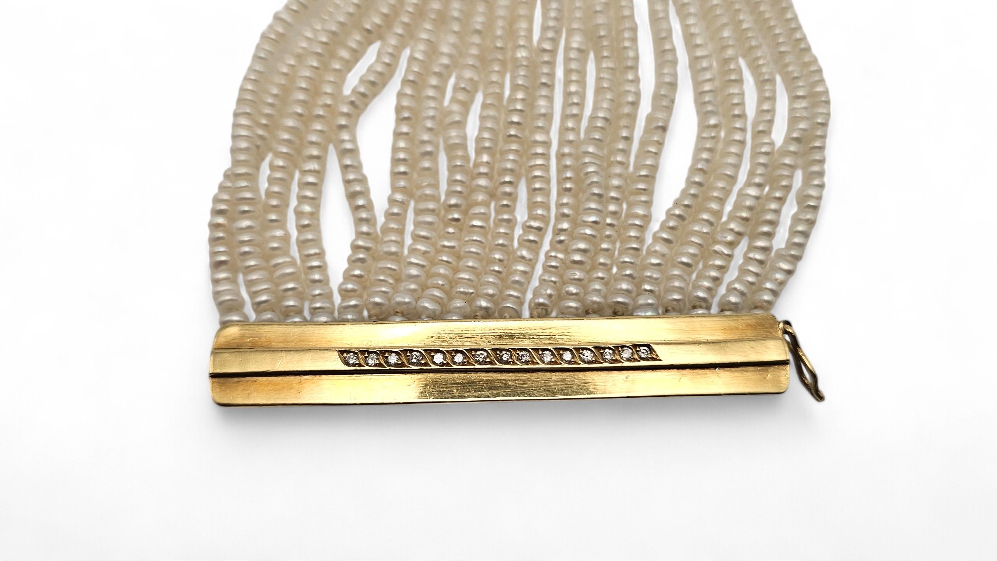 Bracciale in oro e perle di fiume