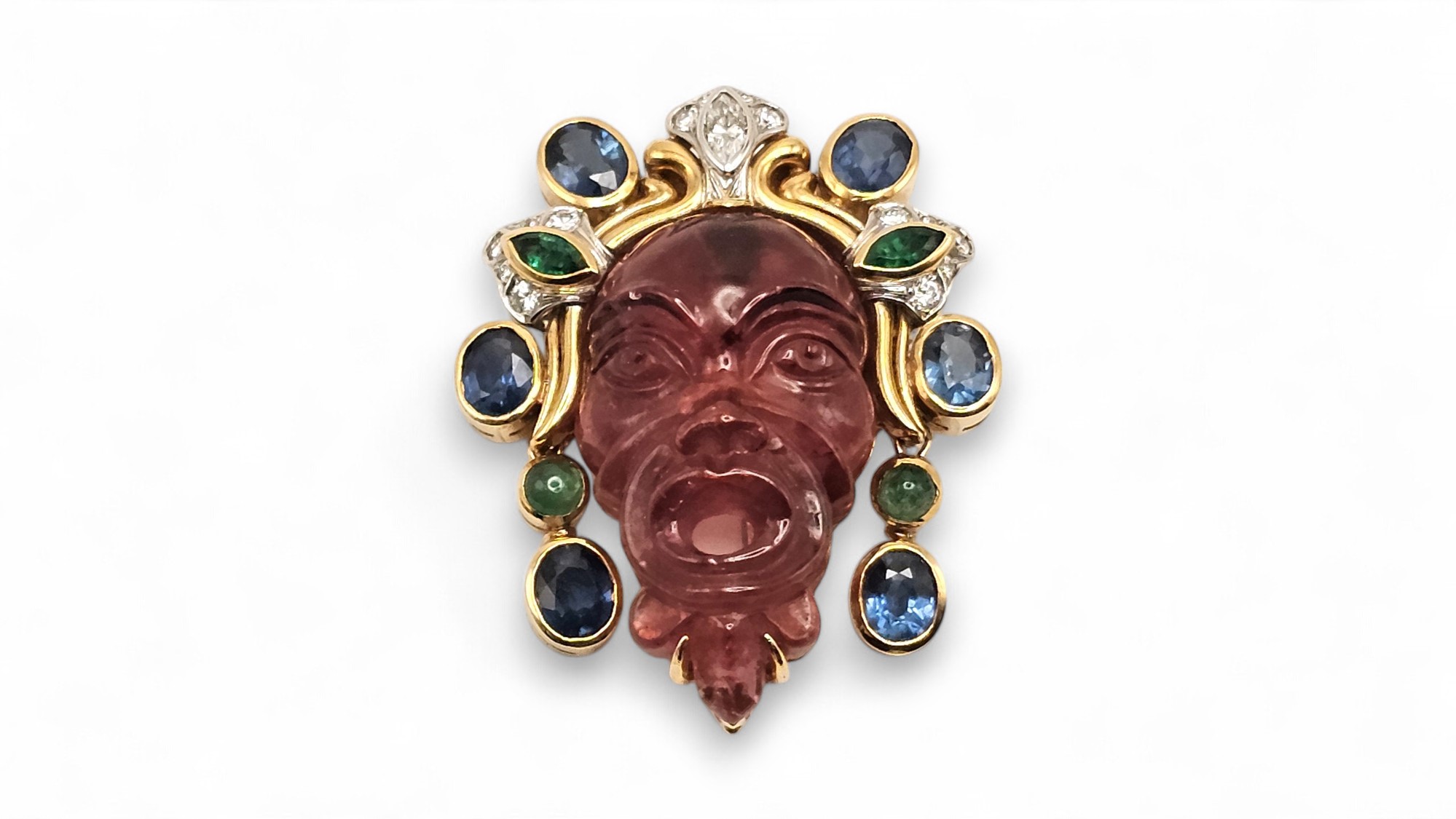 Spilla in oro, rubellite, zaffiri, smeraldi e diamanti