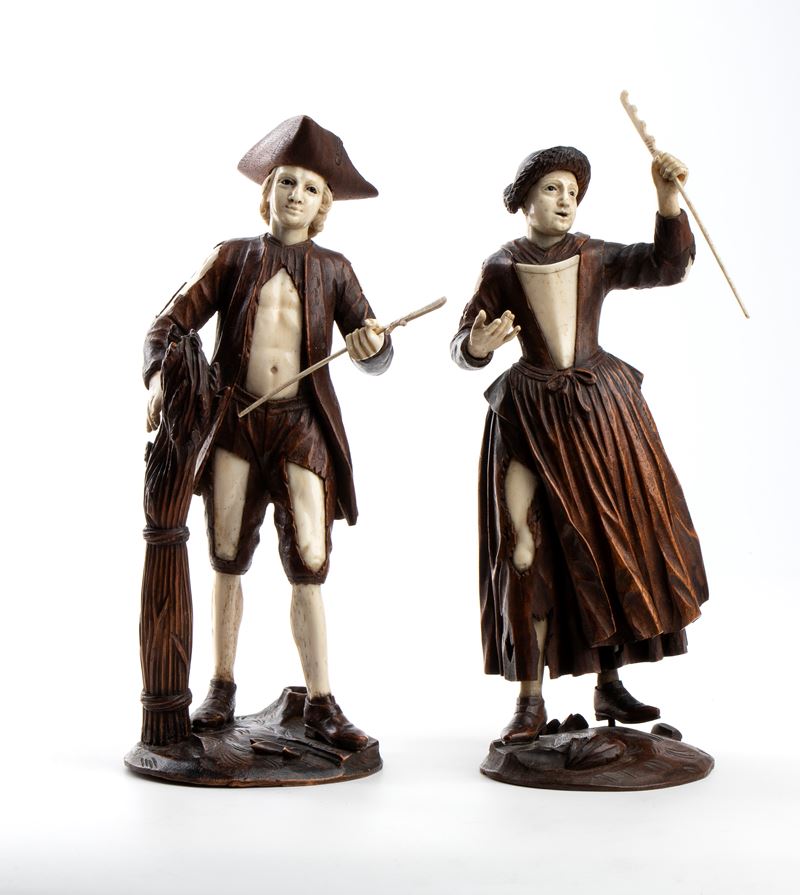 Simon Troger, Coppia di sculture in legno di tiglio e osso raffiguranti figure di contadini