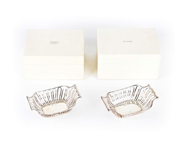 A pair of sterling silver English bread baskets