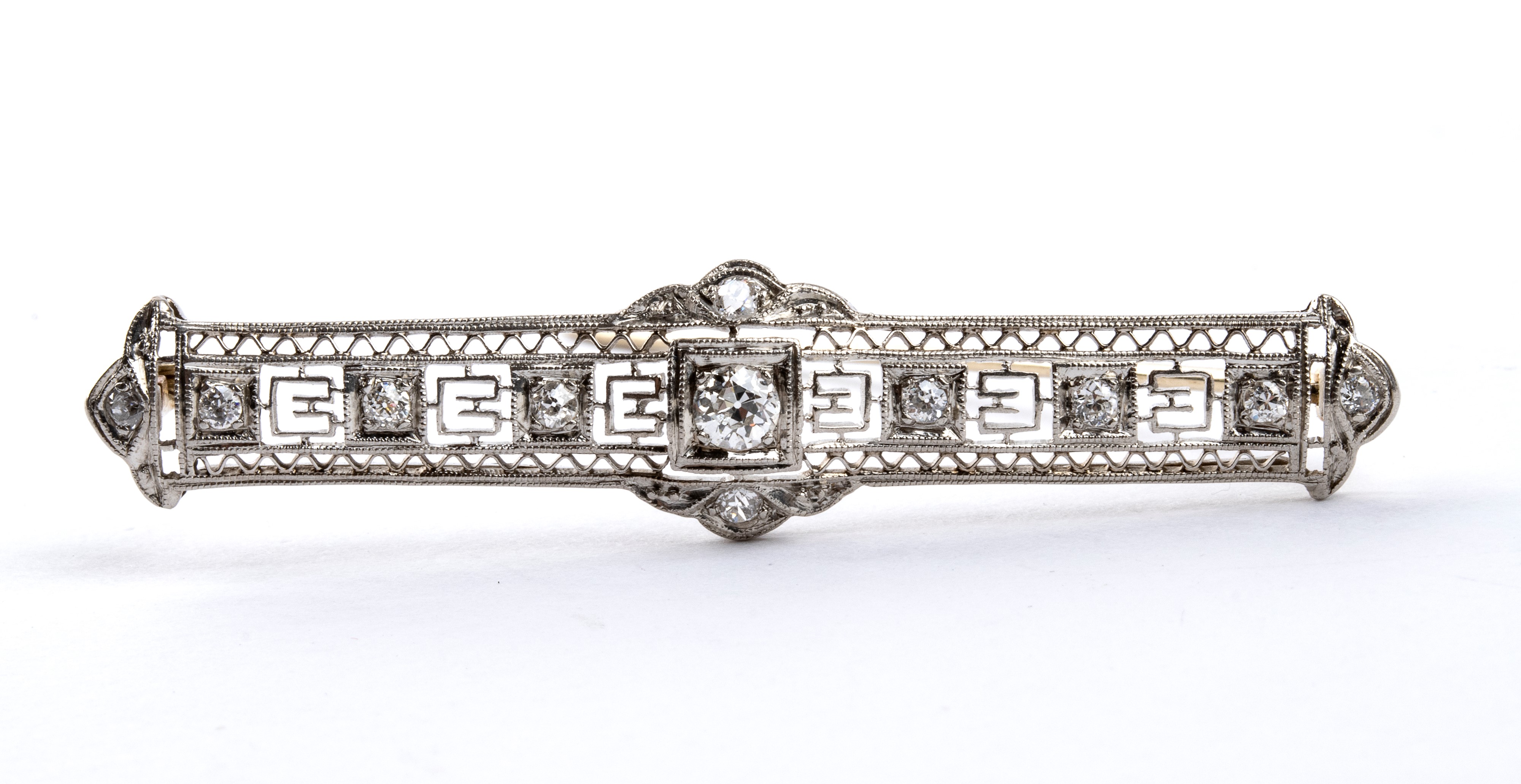 Demi-parure Art Decò, spilla a barretta e anello in platino con diamanti, anni ’30