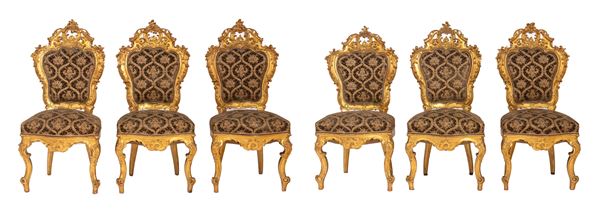 A group of six Italian Louis XVI gilded chairs