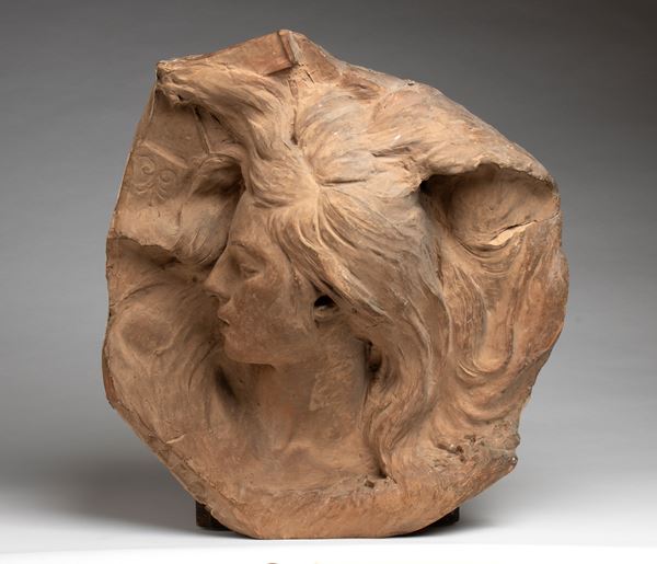 ARRIGO MINERBI 
Ferrara, 1881 - Padova, 1960 - Terracotta with the face of Sappho