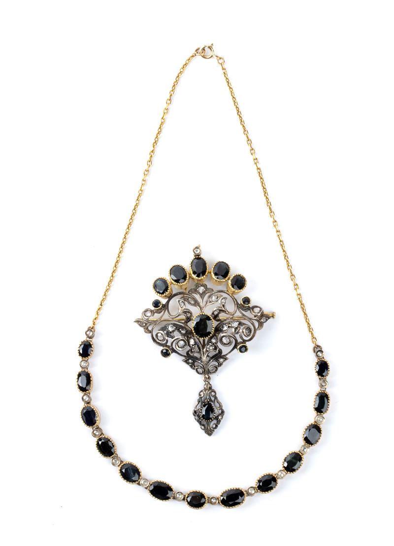 Collana e spilla-pendente, girocollo in oro e argento con zaffiri e diamanti
